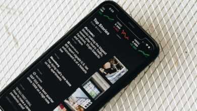 black samsung android smartphone on white textile