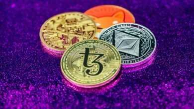 three different types of bitcoins on a purple background