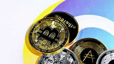 a pile of bitcoins sitting on top of each other