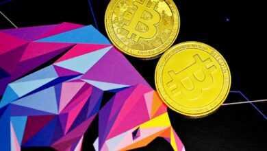 gold round coins on blue and pink paper