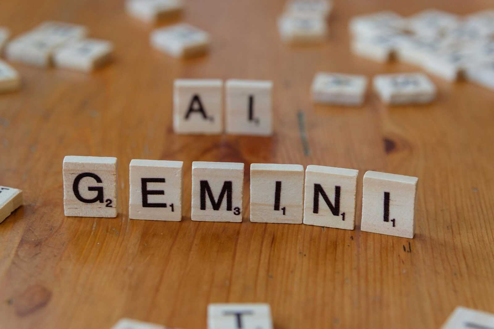 A wooden table topped with scrabble tiles that spell out the word all gen